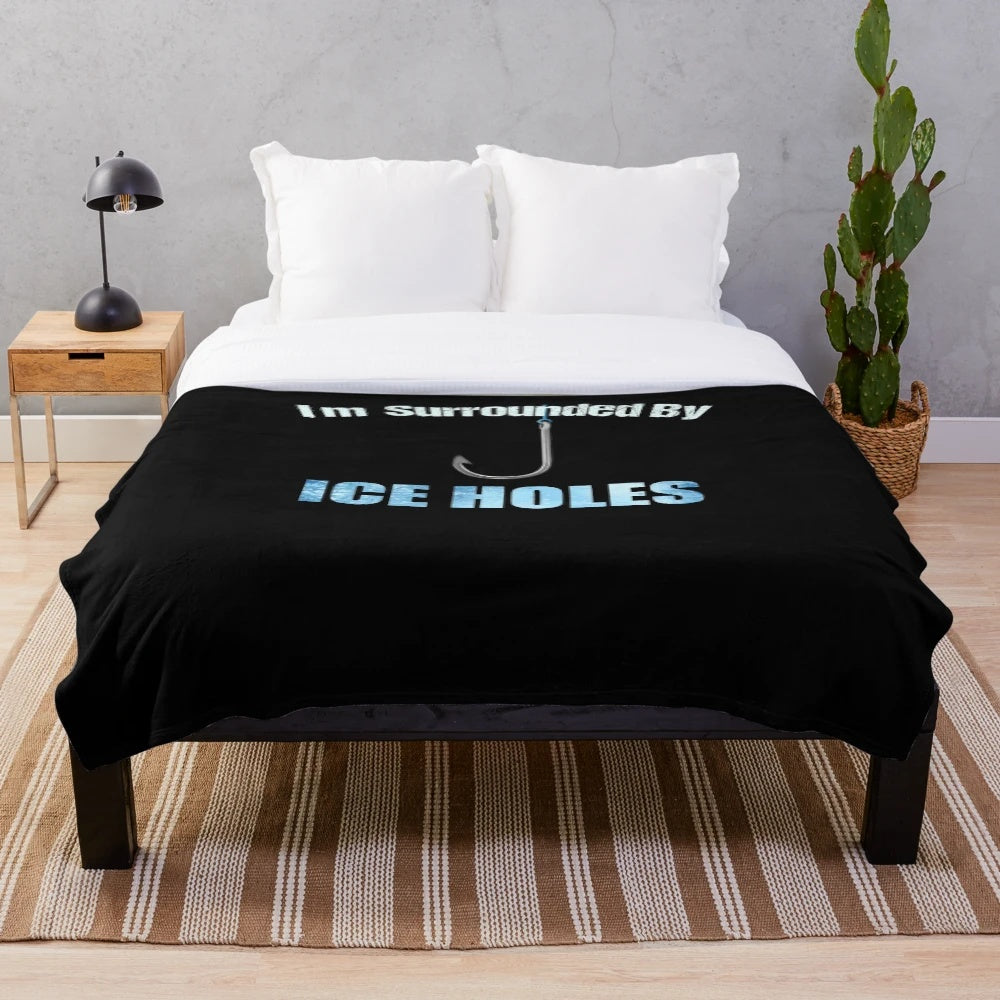 Plush blanket with humorous ice fishing and winter-themed quotes