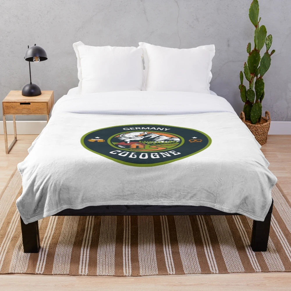 Plush blanket with a German emblem design