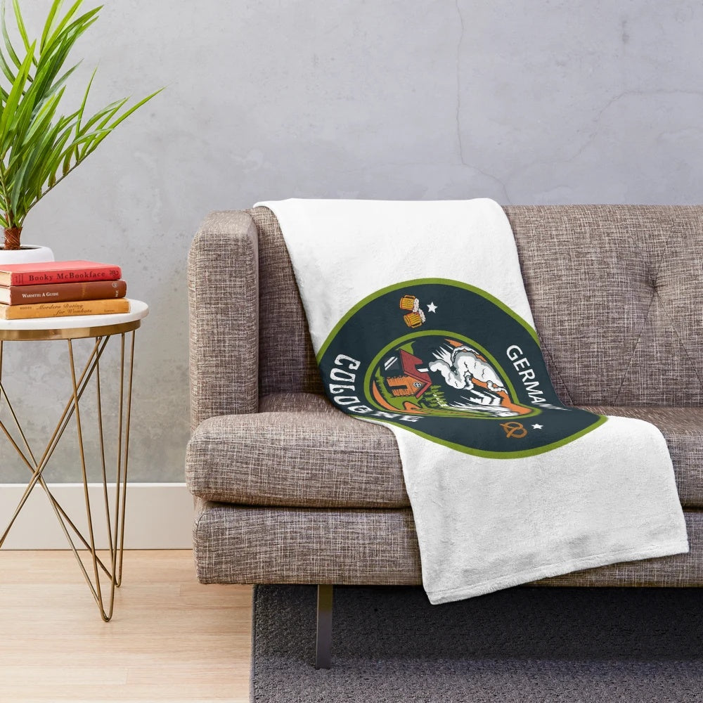 Plush blanket with a German emblem design