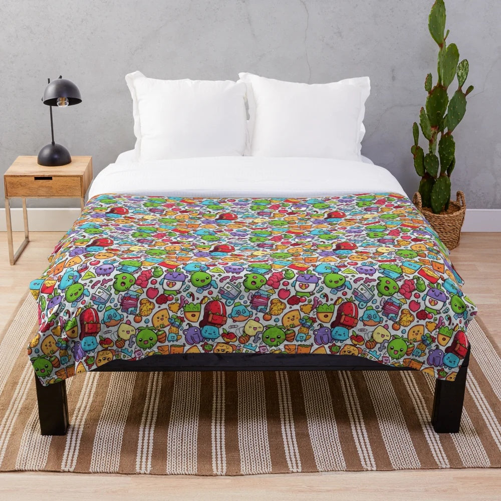 Plush blanket with colorful hobby-themed patterns and designs