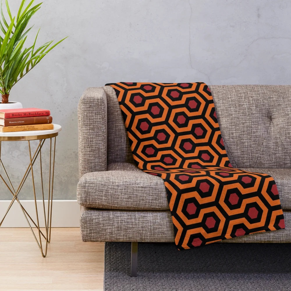 Cozy plush blanket featuring a looped hexagon geometric pattern