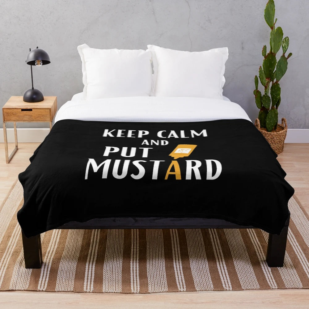 A plush blanket featuring a mustard and ketchup condiment pattern