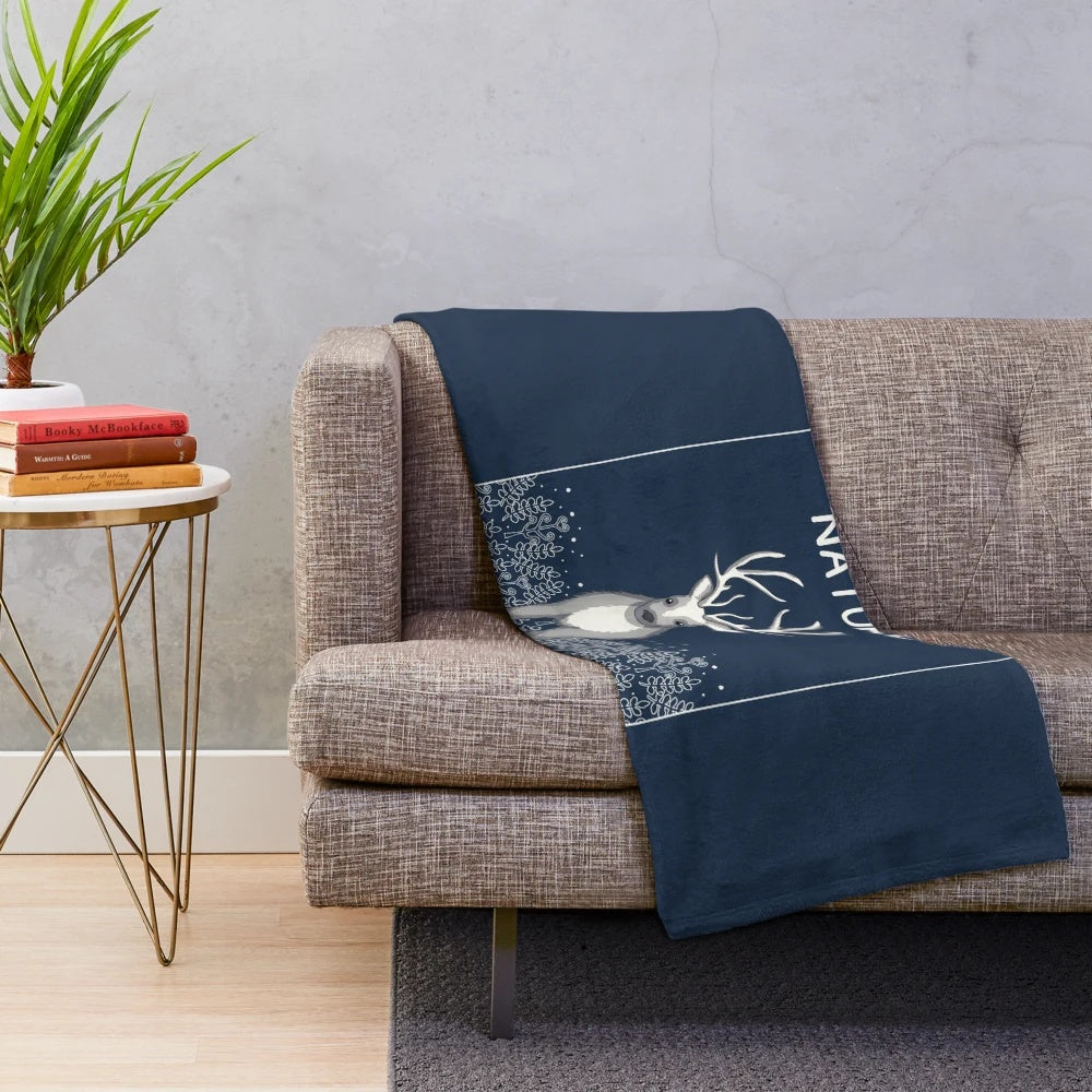 Plush blanket with deer and nature motif design