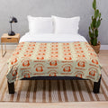 Soft and plush fall-themed blanket with pumpkin spice latte design