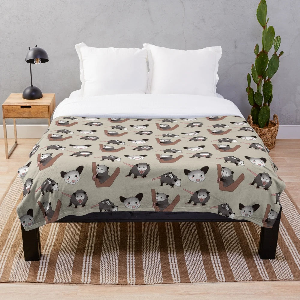 Plush opossum pack blanket with cute opossums