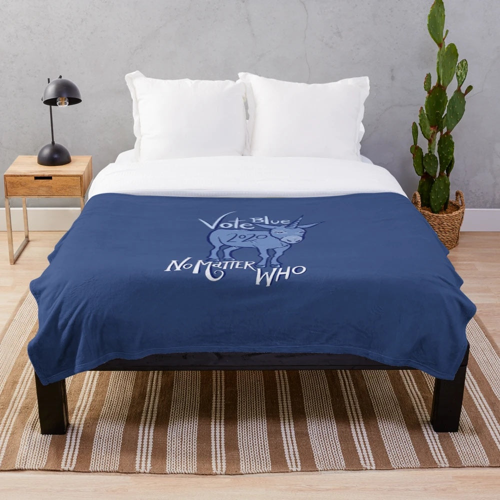 Soft, warm plush blanket featuring a vote blue unicorn and donkey design