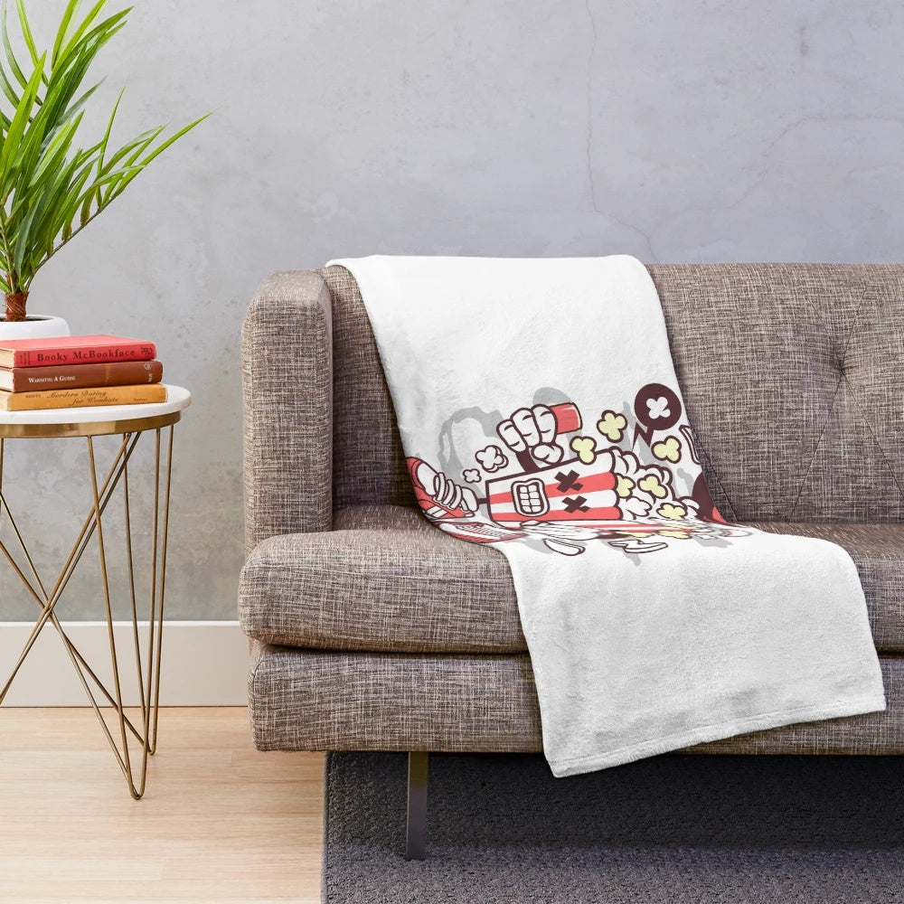 A soft, plush popcorn-themed blanket perfect for movie nights and home theater experiences.