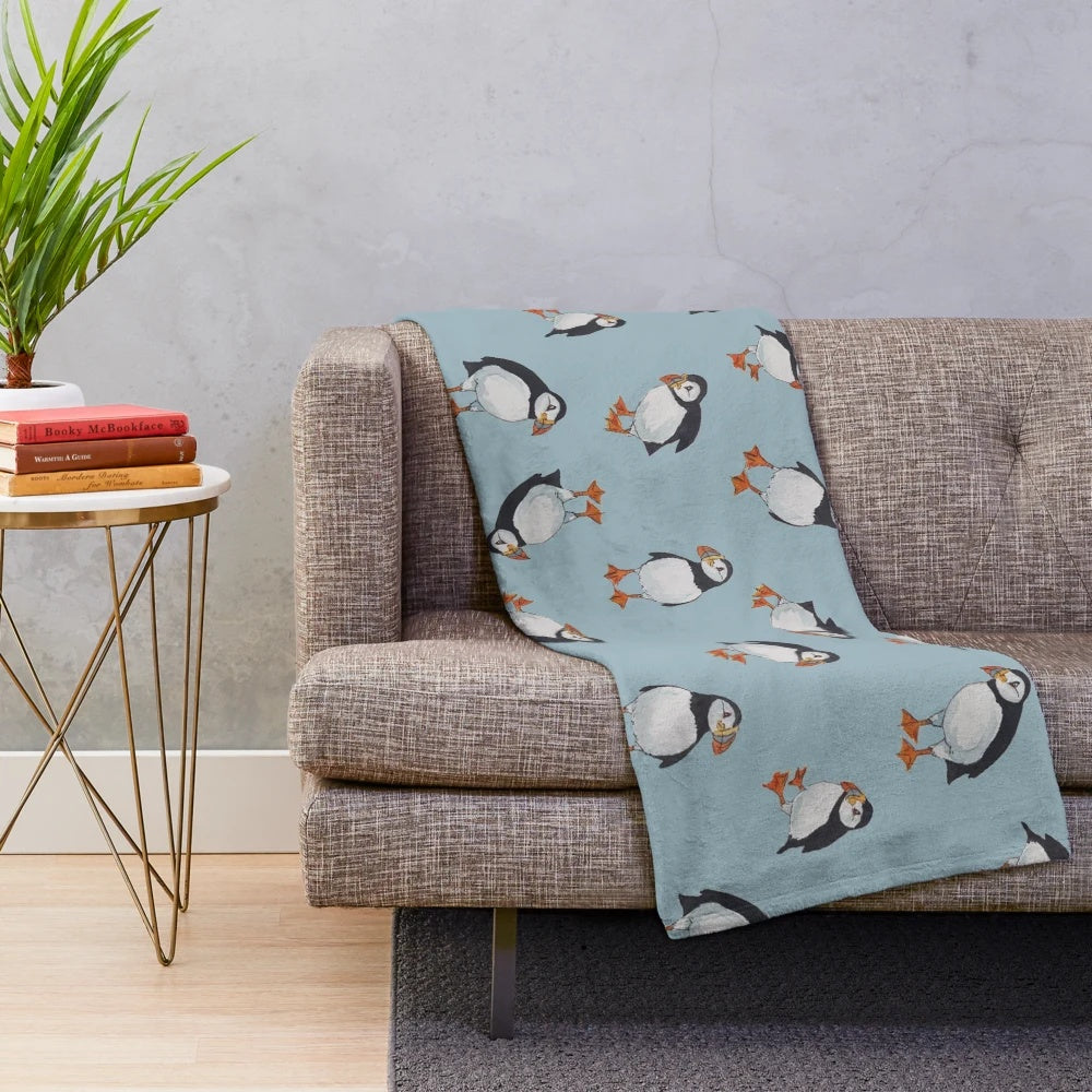 Puffin plush blanket with watercolor and pen and ink artwork
