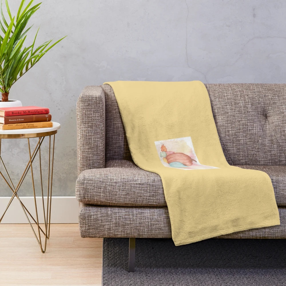 Soft and plush pumpkin-themed blanket in autumn colors
