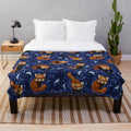 Red panda plush blanket with a colorful floral and nature-inspired pattern