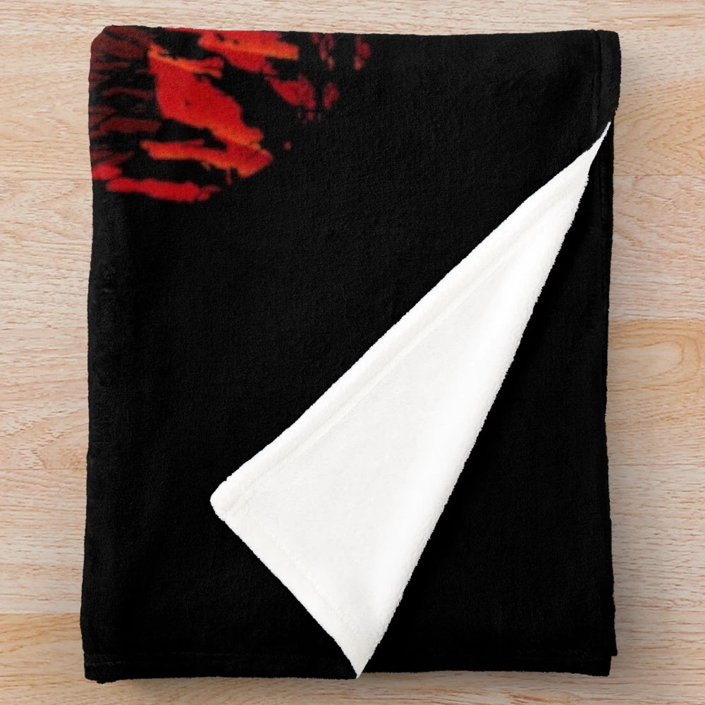 Red plush blanket with video game-inspired design