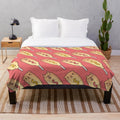 Red plush blanket with a corn dog pattern, featuring cute guinea pigs and capybaras