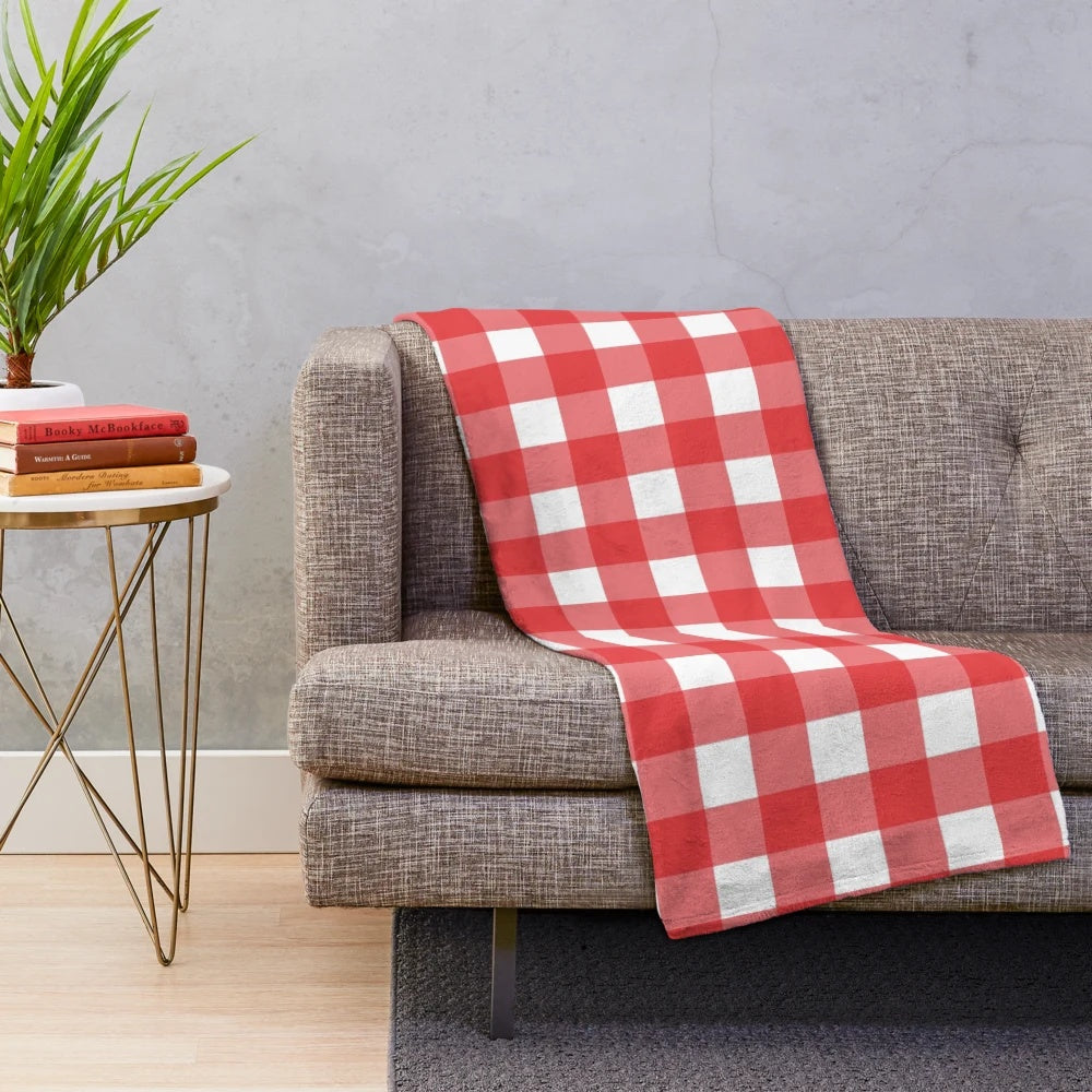 Red and white plaid pattern plush blanket with classic Scottish tartan design