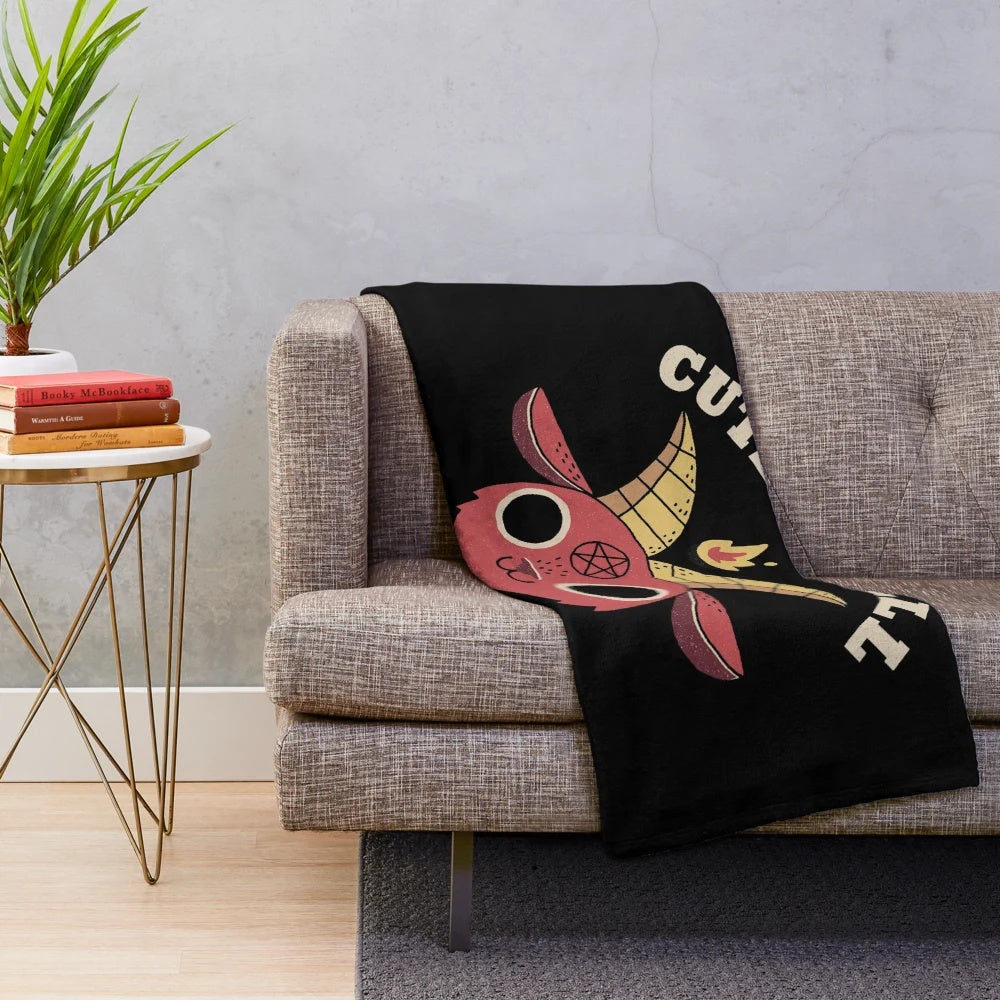 Soft and cozy plush blanket featuring a cute retro demon character design