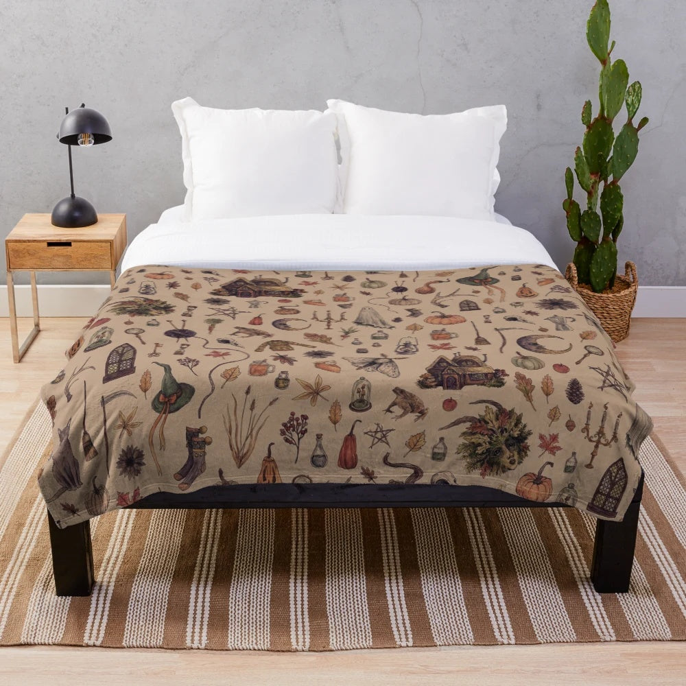 Rustic brown plush blanket with cottagecore and Halloween design elements