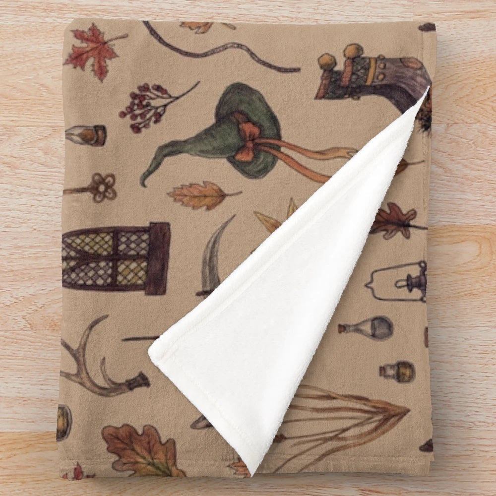 Rustic brown plush blanket with cottagecore and Halloween design elements