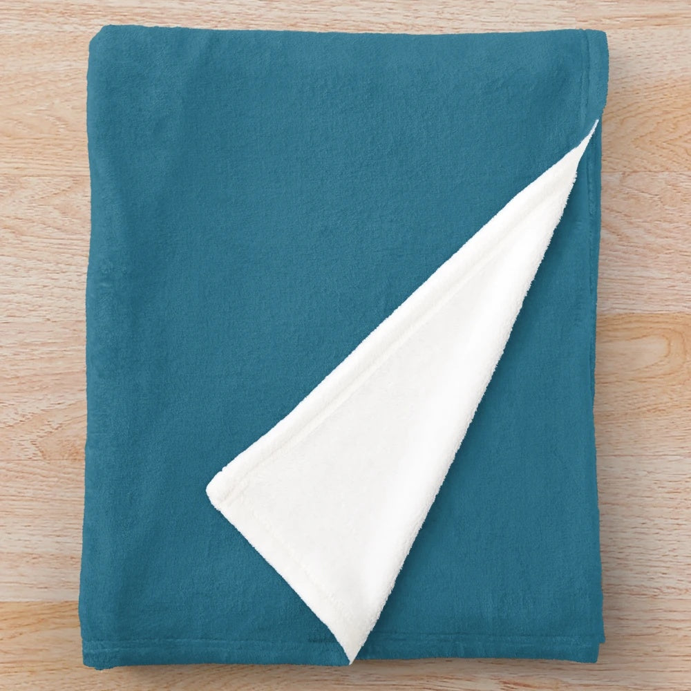 Plush blanket with a sailing-inspired design