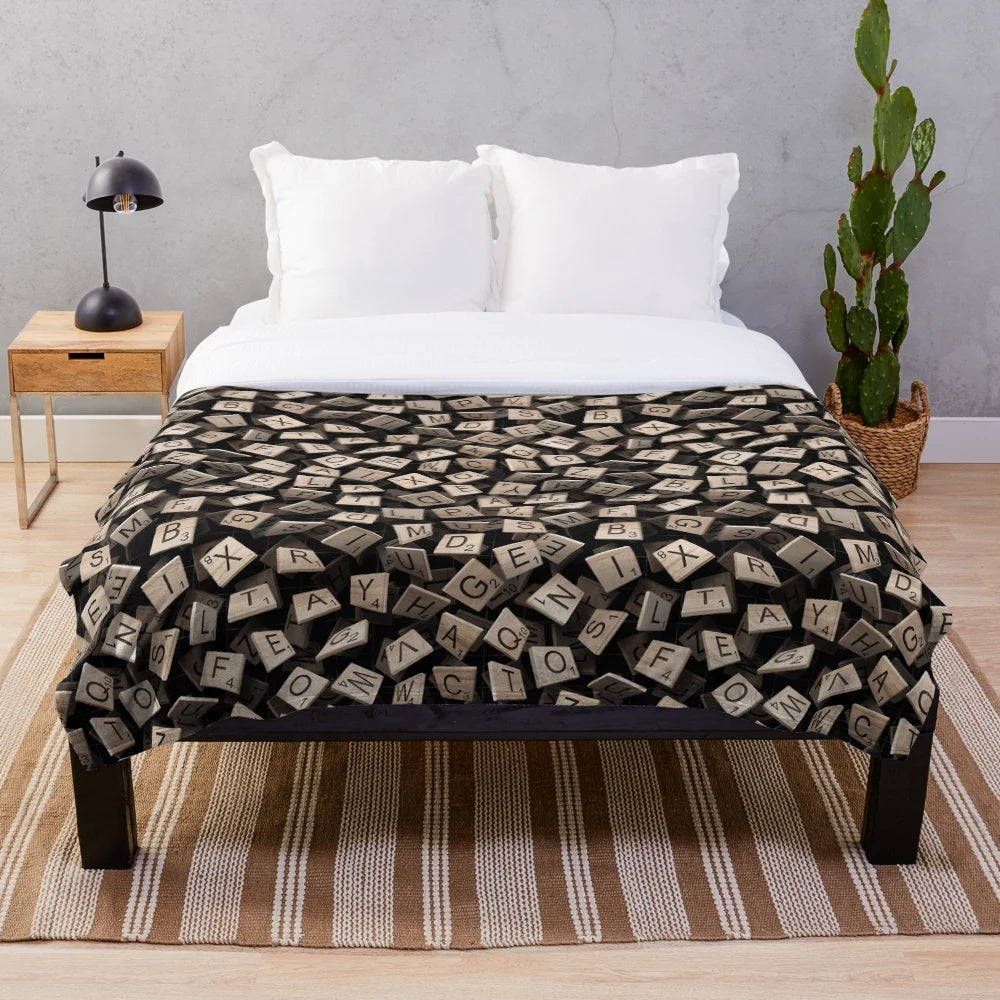 Scrabble tile pattern plush blanket with alphabet letters
