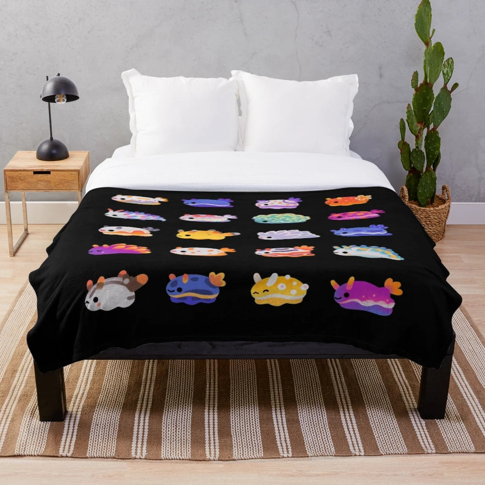 Soft and cuddly plush blanket featuring a vibrant sea slug design