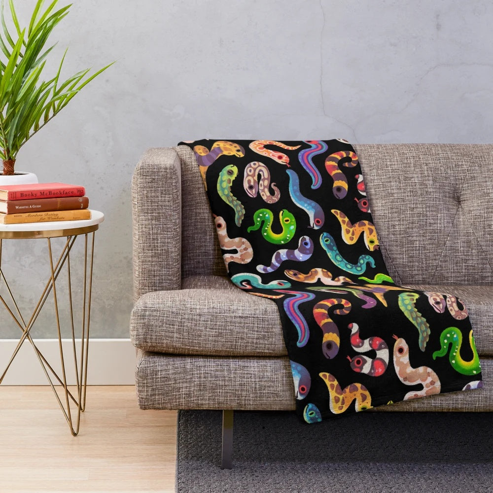 Soft plush blanket with a serpent or snake design, ideal for animal lovers