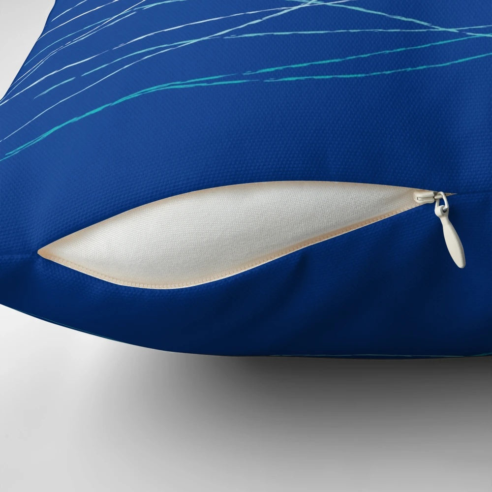 A soft, plush shark-shaped pillow with a playful typographic design, perfect for adding a touch of ocean-inspired style to any room.