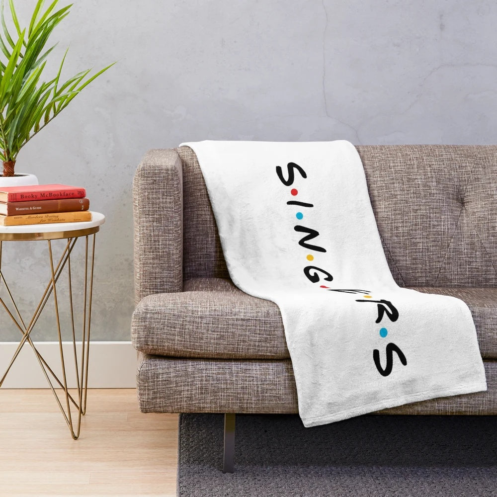 Soft and warm plush blanket featuring a singer design for music lovers