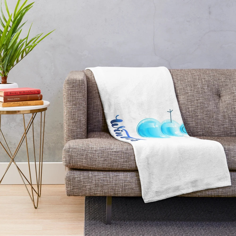 Soft, plush winter-themed blanket with a stylized snow and mountain design