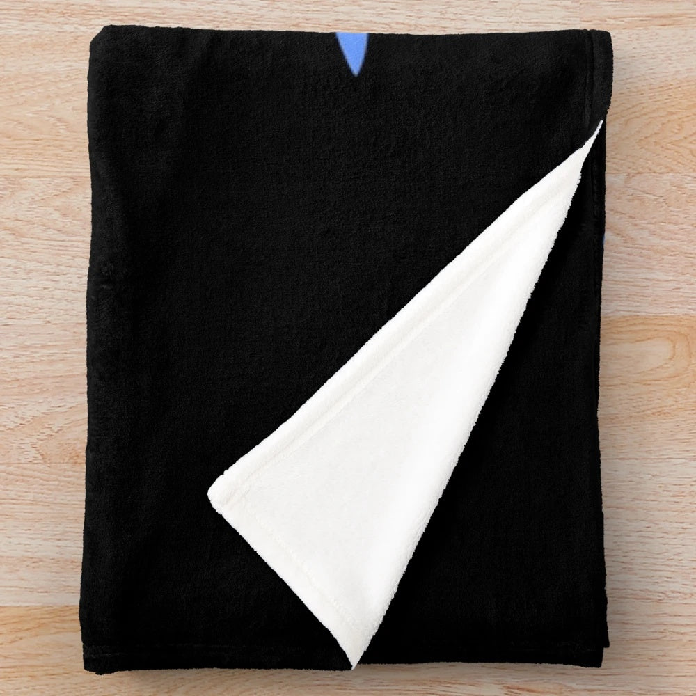 Snowboarding silhouette on plush blanket with snowy mountains