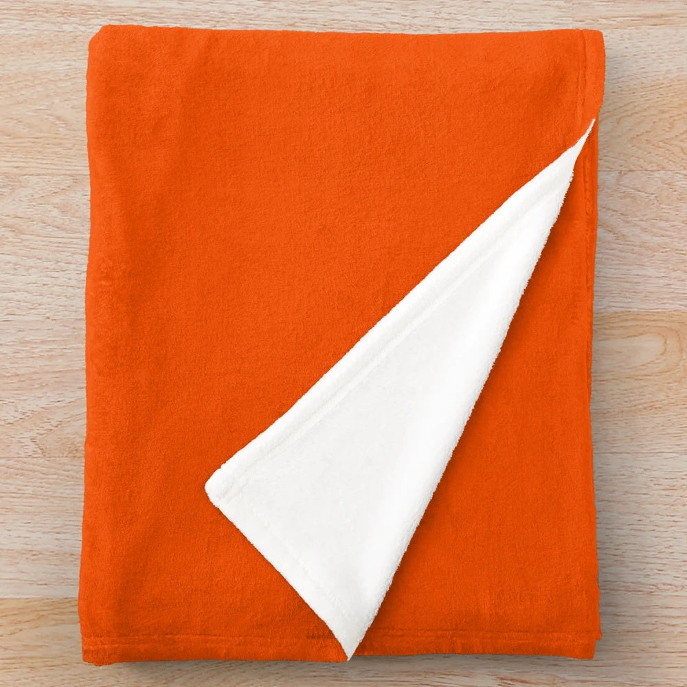 Spiced orange solid color plush blanket with retro 70s vibes