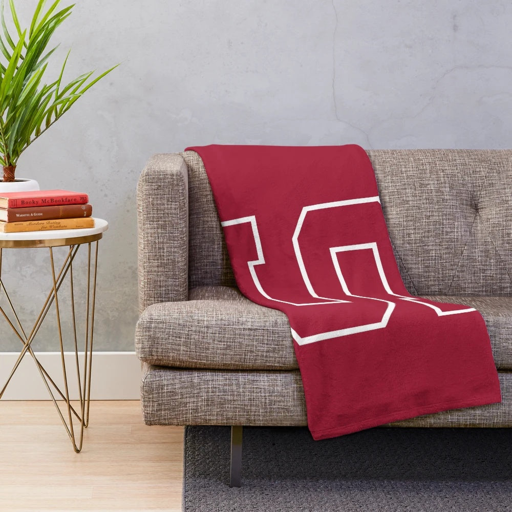 Swarthmore College plush blanket with ice hockey design