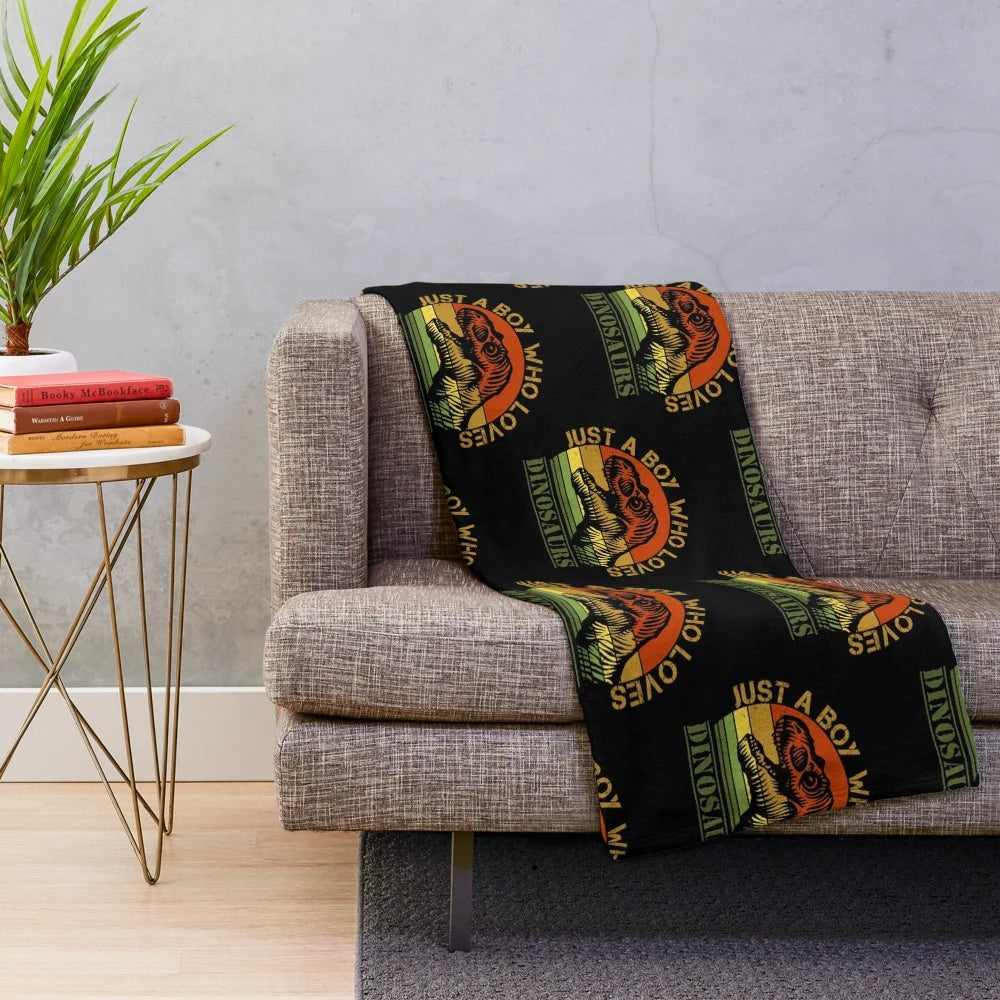 T-Rex plush blanket with "Just a boy who loves dinosaurs" design