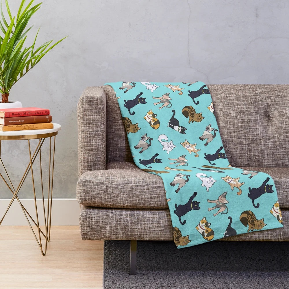 Teal plush blanket with cute cat pattern design