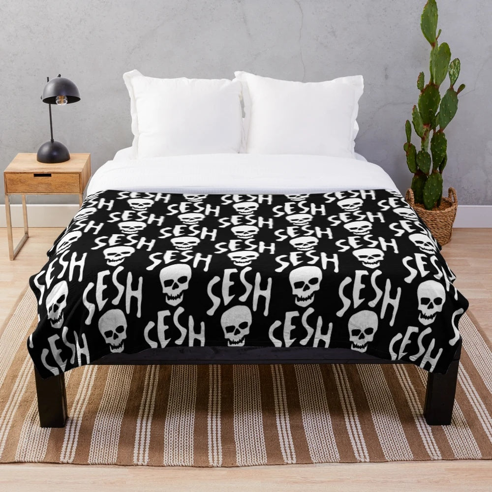 Team Sesh white logo printed on a soft, plush blanket