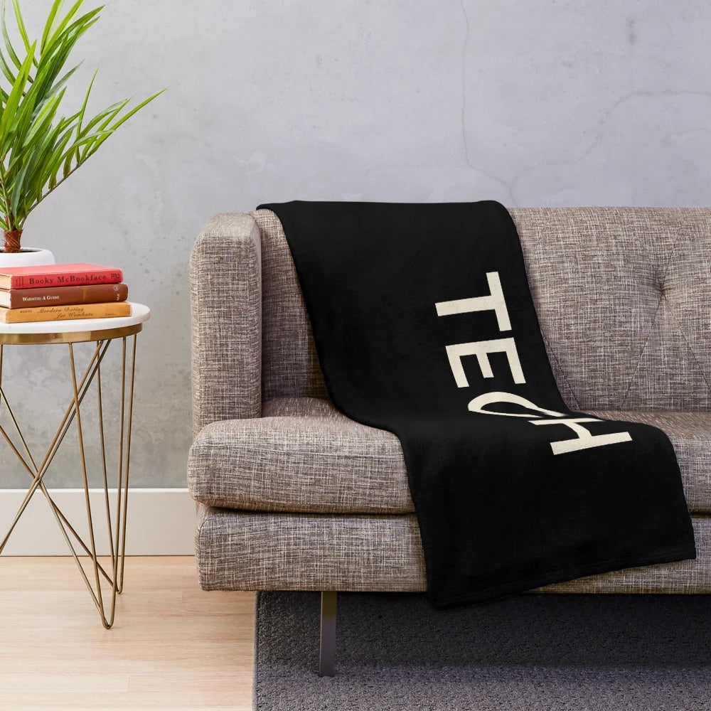 Plush blanket with tech hobbies and programming-themed design