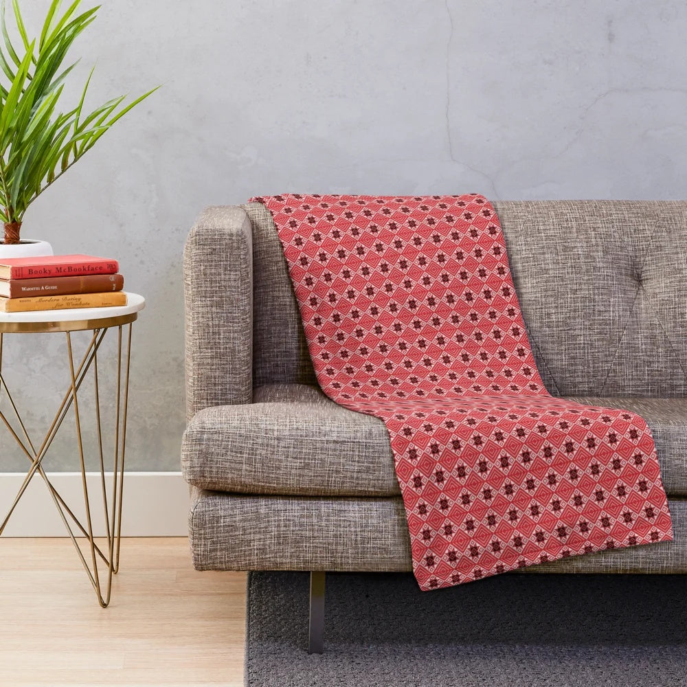 Plush blanket with intricate Thai-inspired pattern