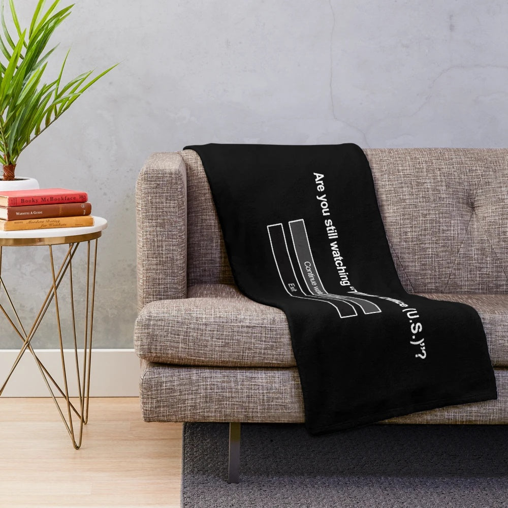 Plush blanket featuring characters from the popular TV series The Office, perfect for Netflix binge watching
