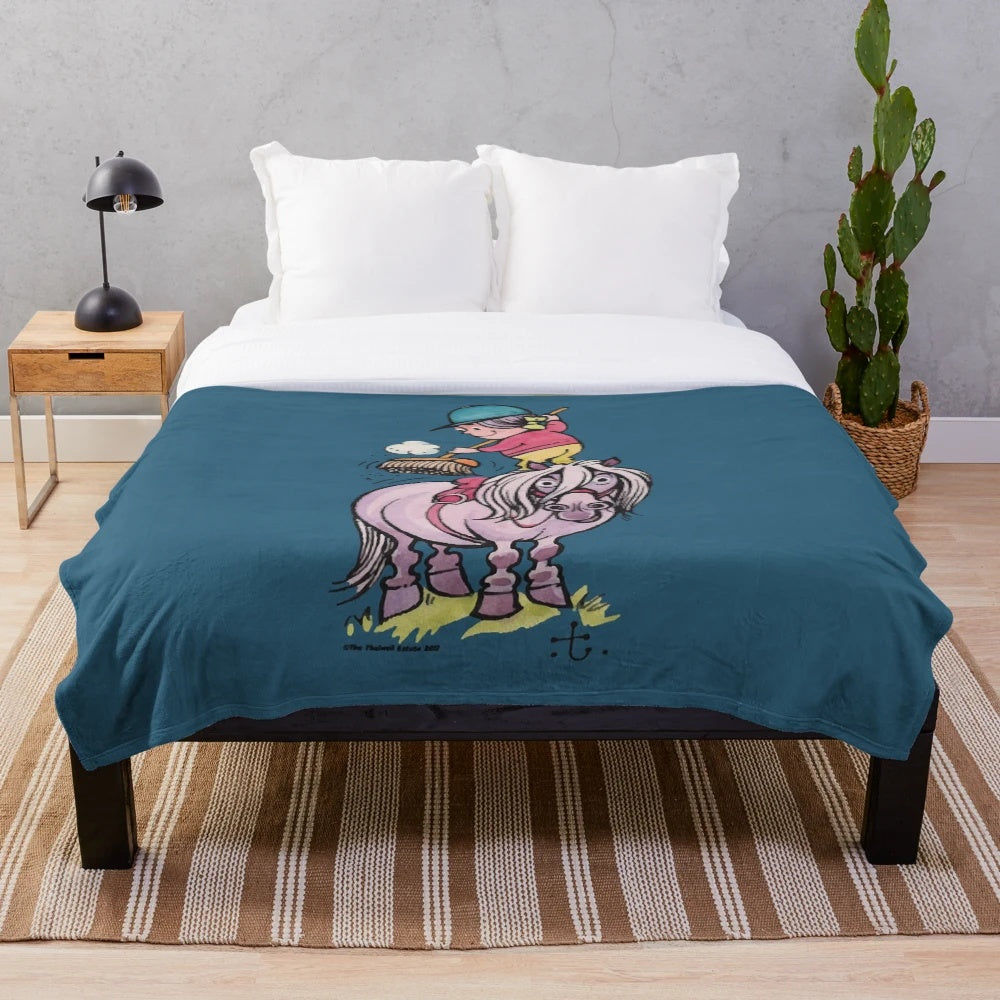 Thelwell rider plush blanket with a horse cleaning design