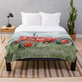 Tractor plush blanket in a rustic, vintage style