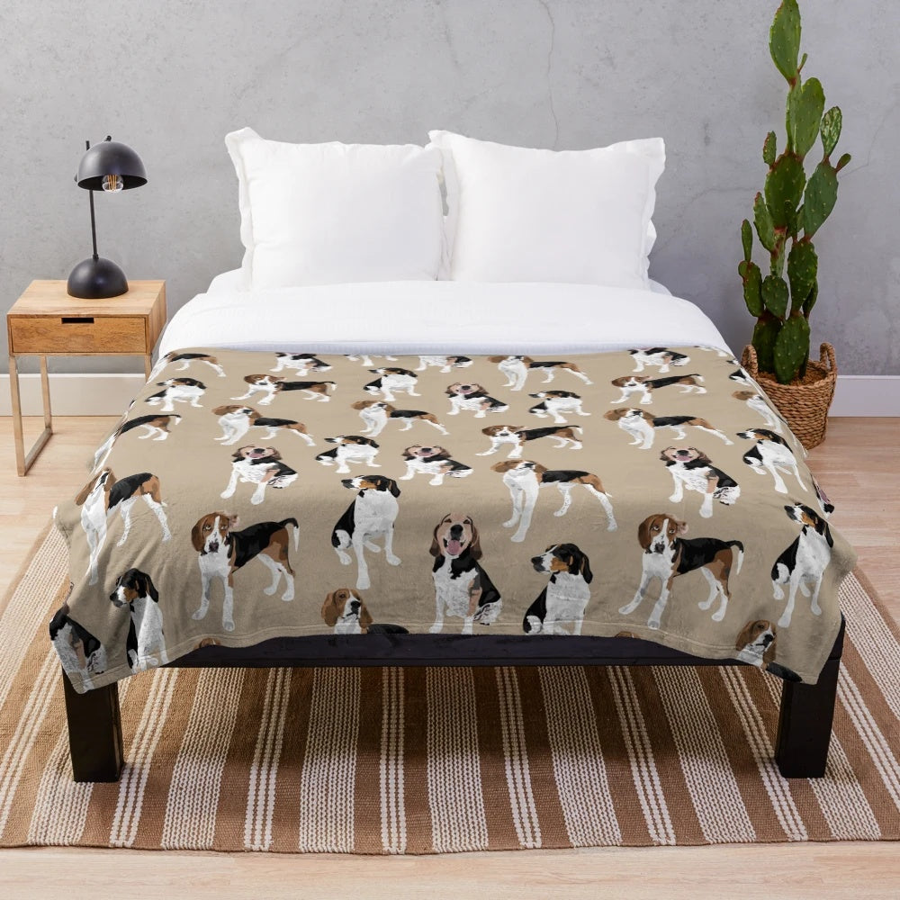 Treeing Walker Coonhound on a tan plush blanket
