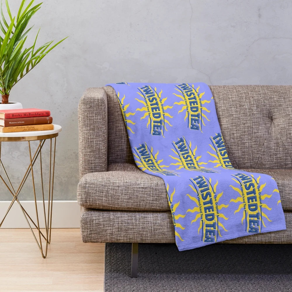 Twisted Tea-themed plush blanket with brand logo