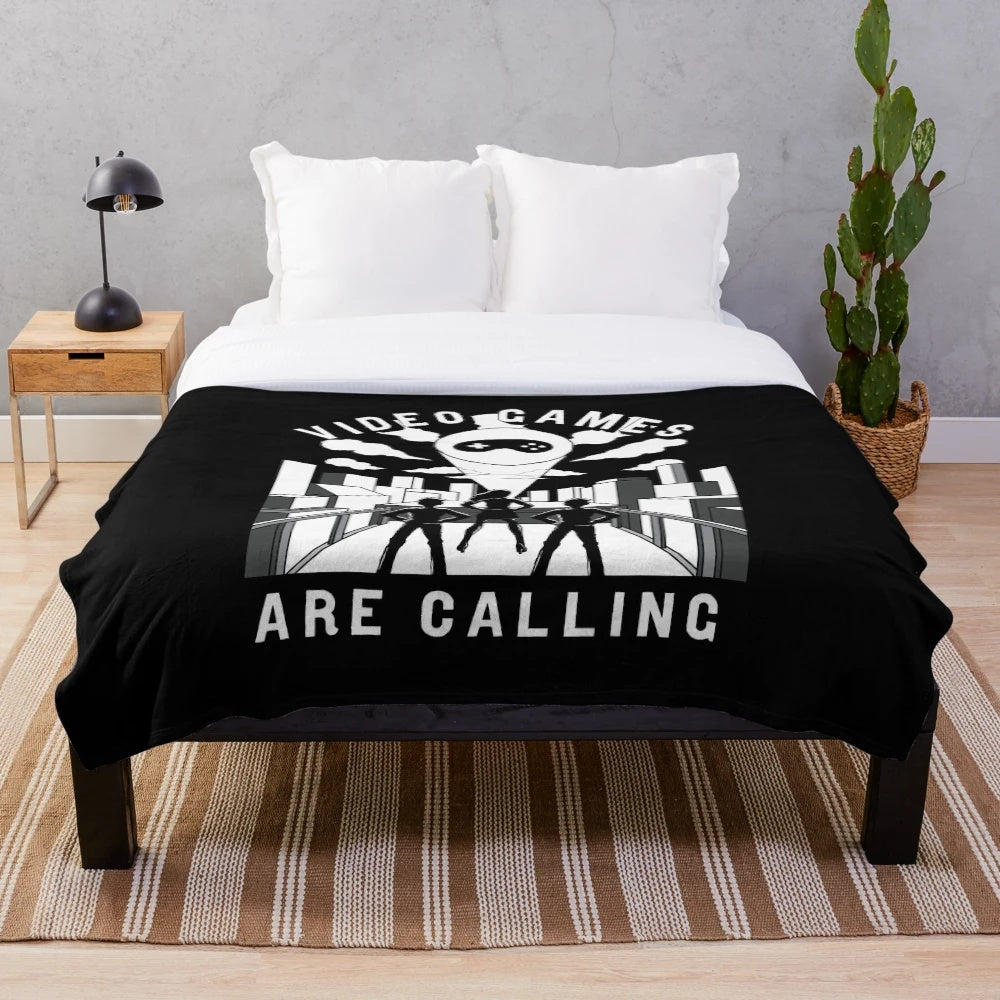 Video game themed plush blanket for console gamers