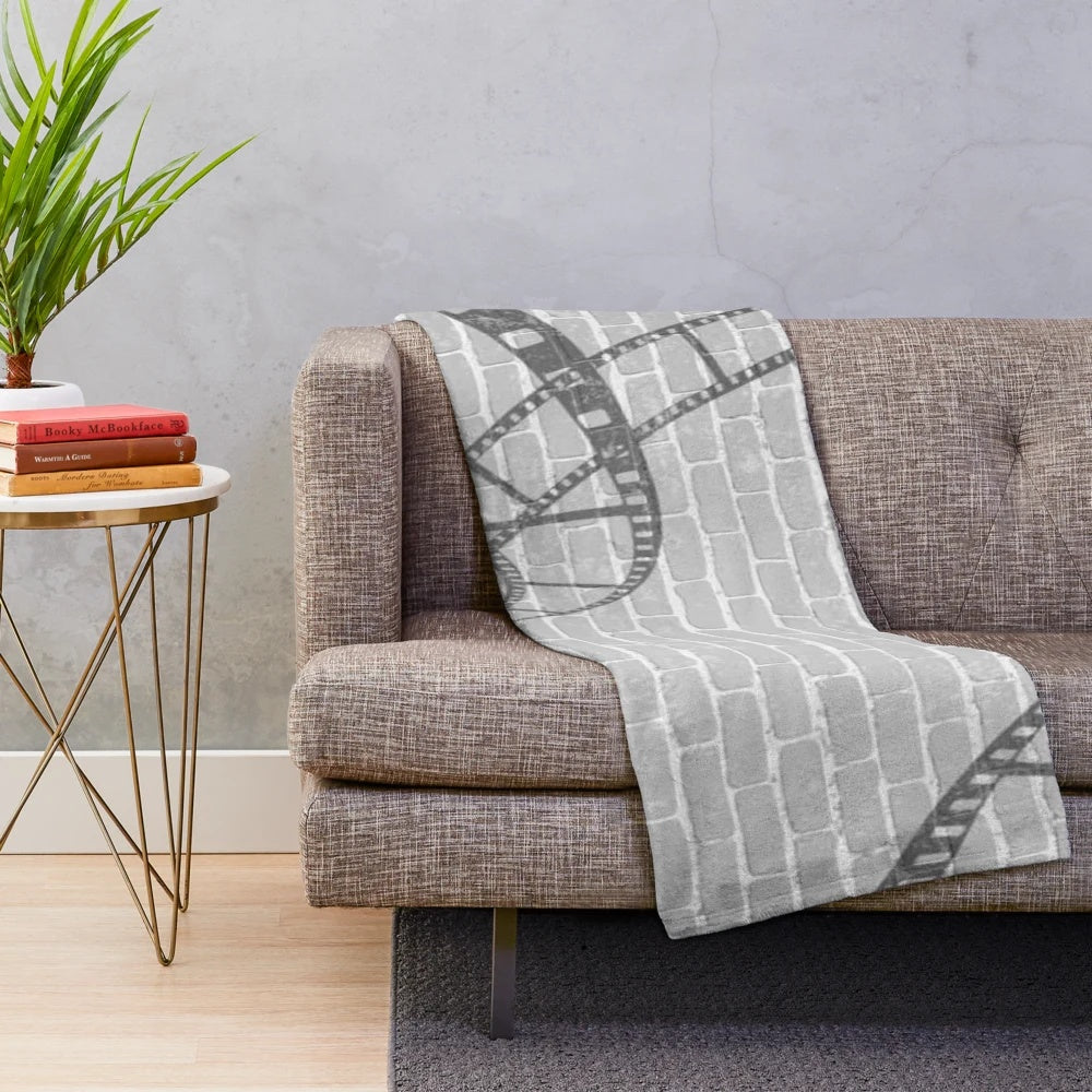 Plush blanket with a vintage cinema wall design