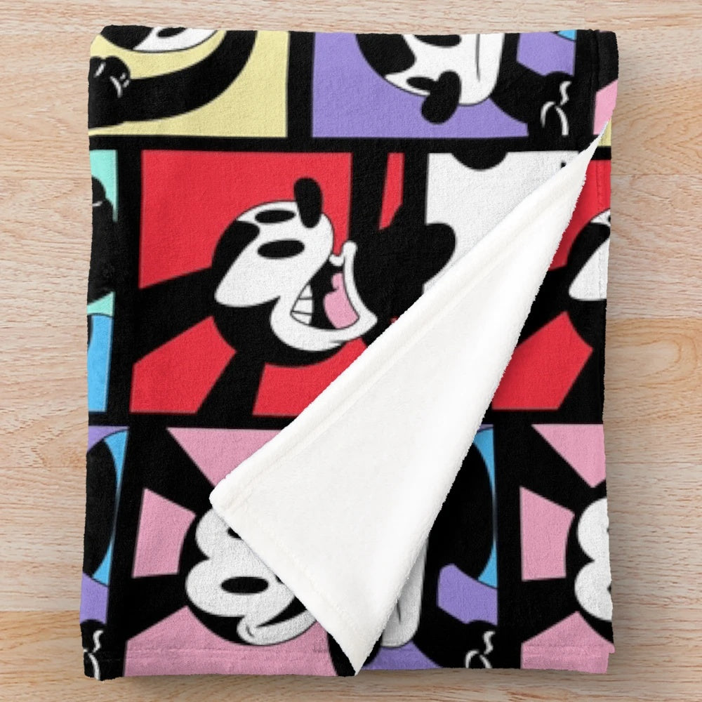 Cozy plush blanket featuring the iconic Oswald the Rabbit character from vintage cartoons