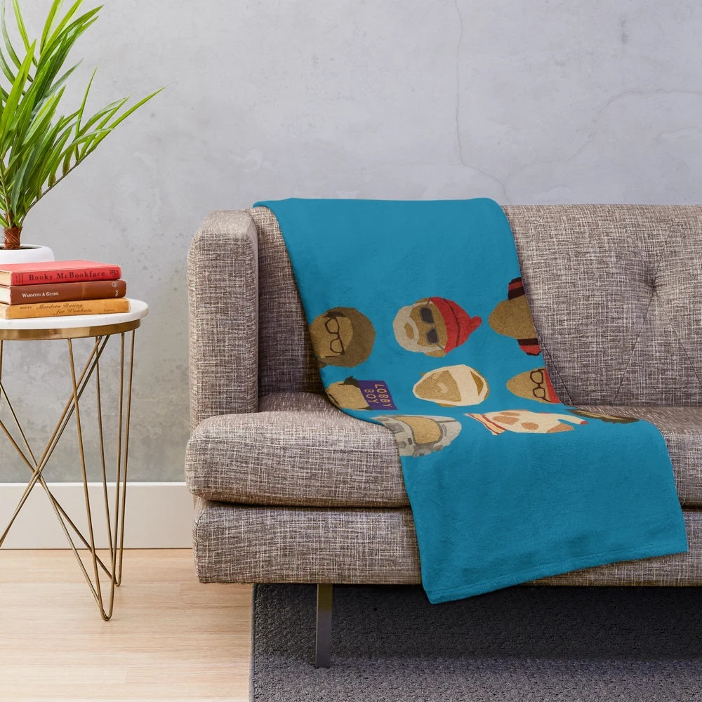 Wes Anderson-inspired plush blanket featuring iconic hats from the director's films