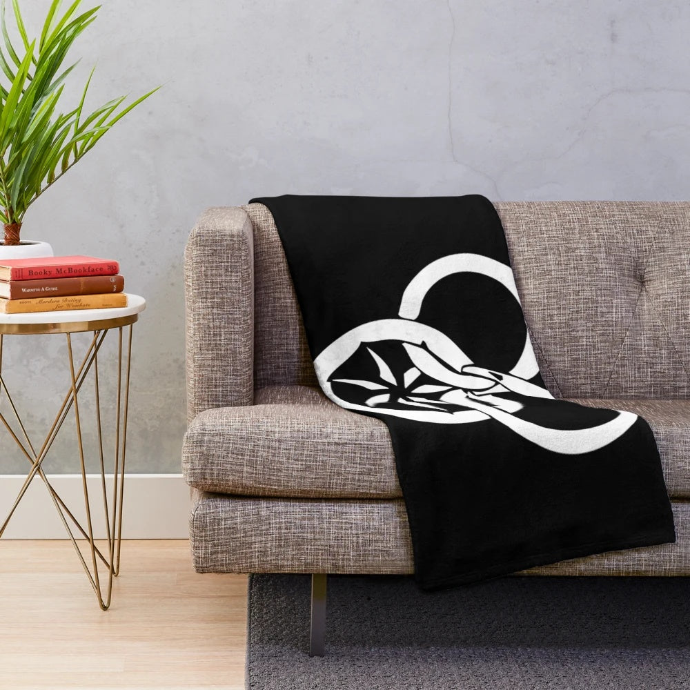 Wheel of Time inspired plush blanket featuring the iconic Wheel of Time symbol