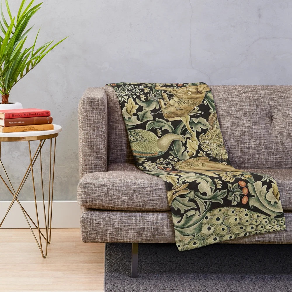 Plush blanket featuring a William Morris inspired forest and floral pattern