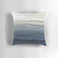 Crashing waves in a blue watercolor landscape design on a decorative pillow