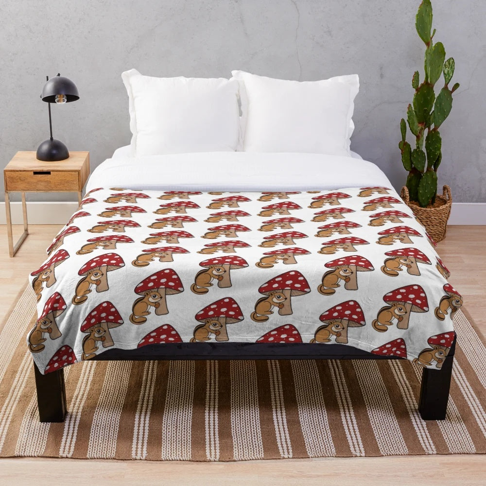 Soft and snuggly chipmunk plush blanket with forest and mushroom design