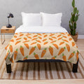 Soft and snuggly plush carrot themed blanket for kids and adults
