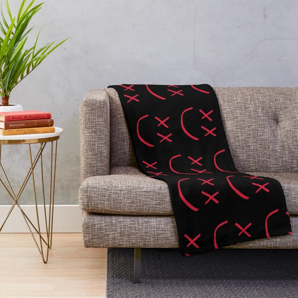 Red plush blanket with Louis Tomlinson's smiley logo